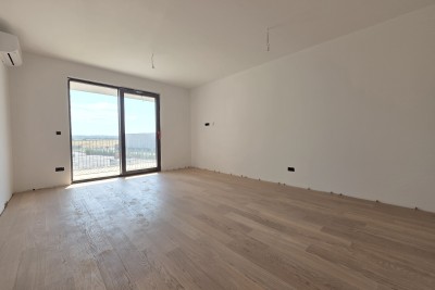 Appartamento di nuova costruzione con due posti auto a Umag - Umago