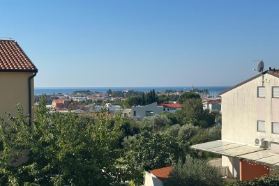 Comfortable apartment with an elevator and an open sea view in Novigrad