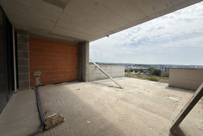 Lussuoso appartamento in un nuovo edificio con ascensore al primo piano con vista sul mare a Cittanova