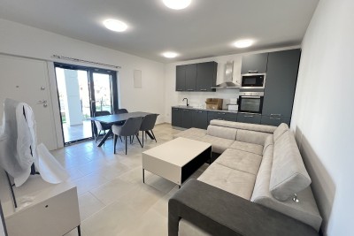 Furnished apartment in a new building only 500 meters from the sea in Novigrad