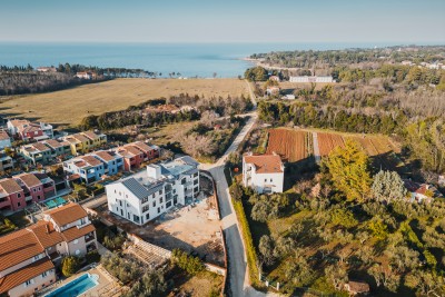 Apartment with a garden 300 m from the sea and the beach in Bašania, near Umag