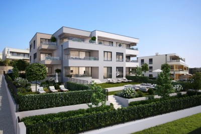 Apartment in a new building with a garden and a view of the sea in a prime location in Novigrad