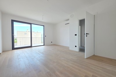 Appartamento in un edificio di nuova costruzione di qualità al terzo piano a Umag - Umago