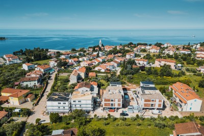 Spacious apartment in a new building on the second floor in Lovrečica